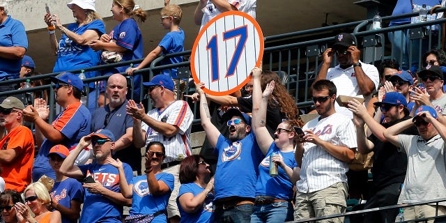 Fans cheer during the jersey retirement ceremony of former New York Met Keith Hernandez prior to a game against the Miami Marlins at Citi Field July 9, 2022, in New York City.