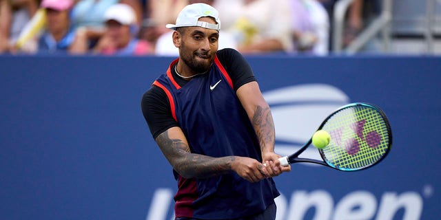 Nick Kyrgios returns a ball against Benjamin Bonzi on Aug. 31, 2022, at USTA Billie Jean King National Tennis Center in the Queens borough of New York City.