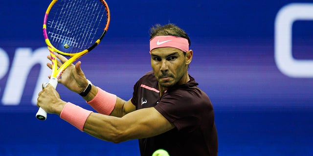 Rafael Nadal of Spain hits a backhand against Fabio Fognini of Italy during the second round of men's singles at the US Open at the USTA Billie Jean King National Tennis Center on September 1, 2022 in New York City. 