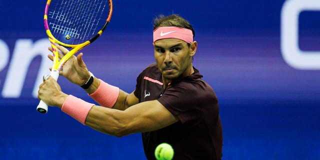 Rafael Nadal of Spain hits a backhand against Fabio Fognini of Italy during the second round of men's singles at the US Open at the USTA Billie Jean King National Tennis Center on September 1, 2022 in New York City.