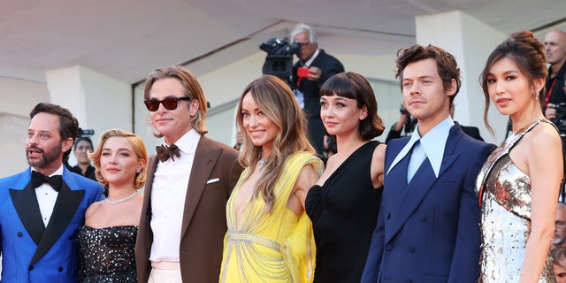 The cast of "Don't Worry Darling" walked the red carpet at the Venice Film Festival. From left: Nick Kroll, Florence Pugh, Chris Pine, Olivia Wilde, Sydney Chandler, Harry Styles and Gemma Chan.