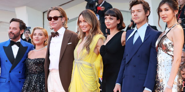 The cast of "Don't Worry Darling" walked the red carpet at the Venice Film Festival. From left: Nick Kroll, Florence Pugh, Chris Pine, Olivia Wilde, Sydney Chandler, Harry Styles and Gemma Chan.