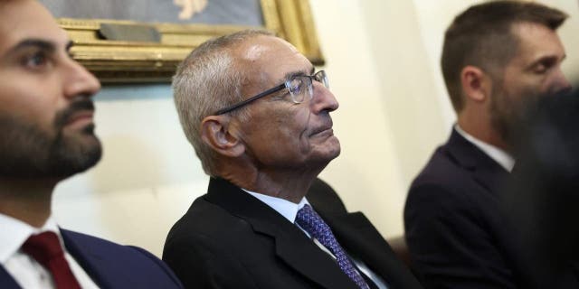 John Podesta listens as President Biden delivers remarks during a White House cabinet meeting on Sept. 6.