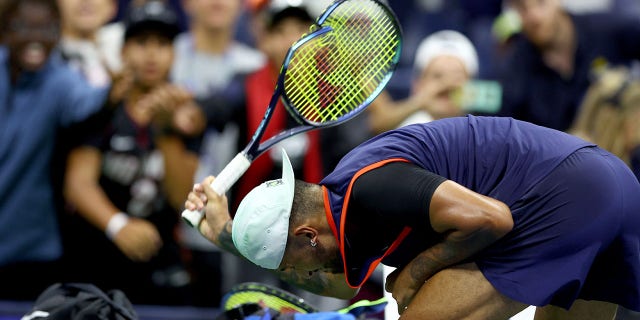 Nick Kyrgios of Australia smashes his racket after being defeated by Karen Khachanov in a men’s quarterfinal match of the 2022 U.S. Open at USTA Billie Jean King National Tennis Center Sept. 6, 2022, in the Flushing neighborhood of the Queens borough of New York City.