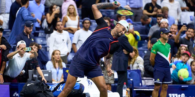 Nick Kyrgios of Australia smashes his racket after being defeated by Karen Khachanov in their men’s singles quarterfinal match of the 2022 U.S. Open at USTA Billie Jean King National Tennis Center Sept. 6, 2022, in the Flushing neighborhood of the Queens borough of New York City.  