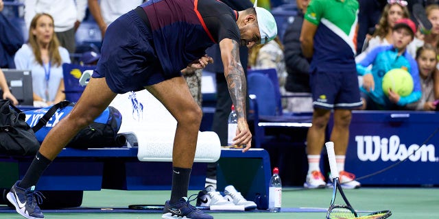 Nick Kyrgios of Australia smashes his racket after being defeated by Karen Khachanov at the 2022 U.S. Open at USTA Billie Jean King National Tennis Center Sept. 6, 2022, in the Flushing neighborhood of the Queens borough of New York City.