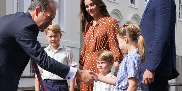 The royal children, along with their parents, were greeted upon their arrival for preview day for new students.