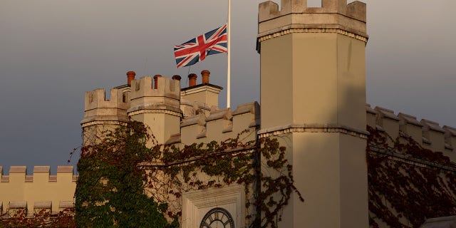 Flags are flown at half-mast on the Wentworth Club House following the announcement of the death of Her Majesty Queen Elizabeth II during Day One of the BMW PGA Championship at Wentworth Golf Club on September 08, 2022, in Virginia Water, England.