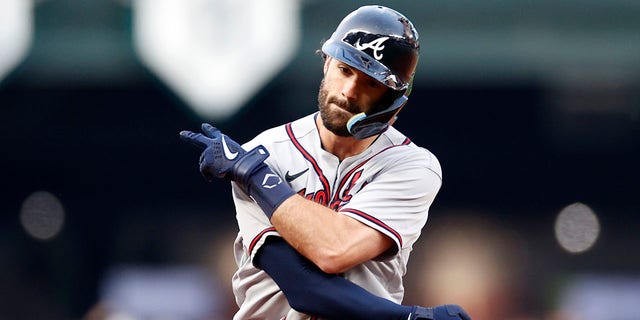 Dansby Swanson of the Atlanta Braves celebrates a two-run homer against the Seattle Mariners in the first inning on Sept. 9, 2022 at T-Mobile Park in Seattle. 