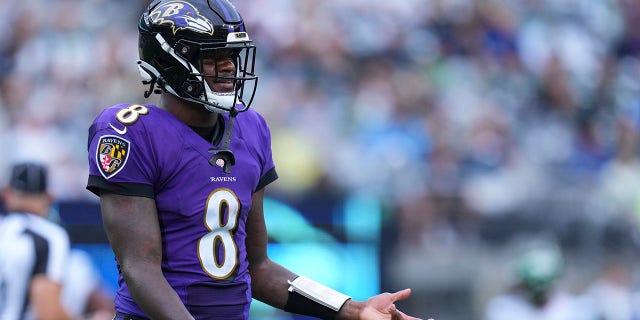 Lamar Jackson #8 of the Baltimore Ravens reacts against the New York Jets at MetLife Stadium on September 11, 2022 in East Rutherford, New Jersey.