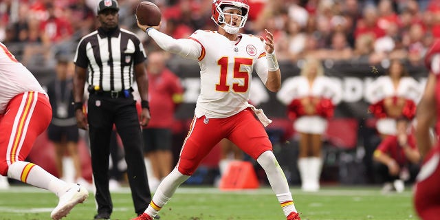 Kansas City Chiefs quarterback Patrick Mahomes throws a pass against the Cardinals at State Farm Stadium on September 11, 2022 in Glendale, Arizona.