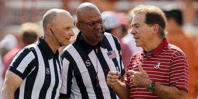 Head coach Nick Saban of the Alabama Crimson Tide talks with officials before a game against the Texas Longhorns at Darrell K Royal-Texas Memorial Stadium Sept. 10, 2022, in Austin, Texas. 