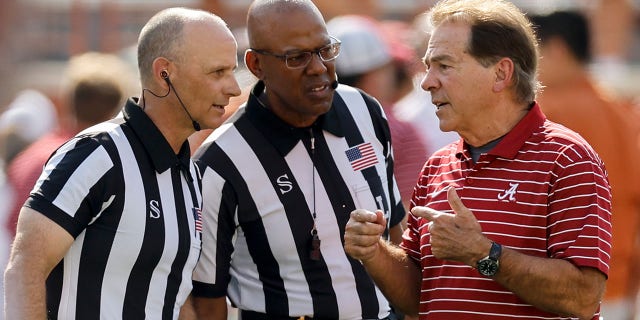 Head coach Nick Saban of the Alabama Crimson Tide talks with officials before a game against the Texas Longhorns at Darrell K Royal-Texas Memorial Stadium Sept. 10, 2022, in Austin, Texas. 