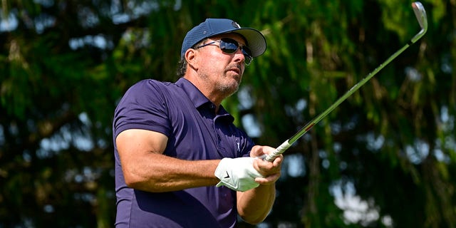 Team Captain Phil Mickelson of Hy Flyers GC plays his shot on the third tee on the first day of the LIV Golf Invitational - Chicago on September 16, 2022 at Rich Harvest Farms in Sugar Grove, Illinois. 