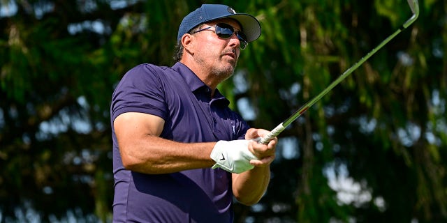 Team Captain Phil Mickelson of Hy Flyers GC plays his shot on the third tee on the first day of the LIV Golf Invitational - Chicago on September 16, 2022 at Rich Harvest Farms in Sugar Grove, Illinois. 