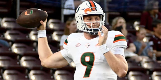 Miami Hurricanes number 9 Tyler Van Dyke warms up before the game against the Texas A&M Aggies at Kyle Field on September 29.  died December 17, 2022 in College Station, Texas. 