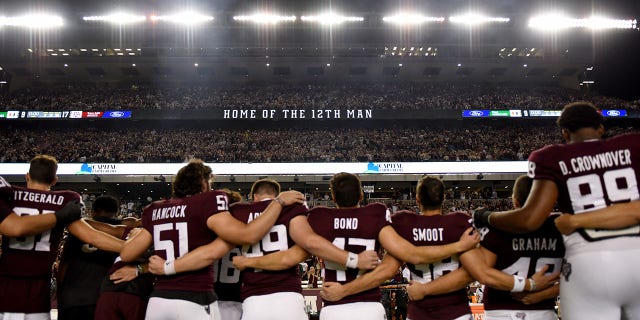 The Texas A&M Aggies celebrate on the field after defeating the Miami Hurricanes with a score of 9 to 17 after their game at Kyle Field on Sept. 17, 2022 in College Station, Texas.