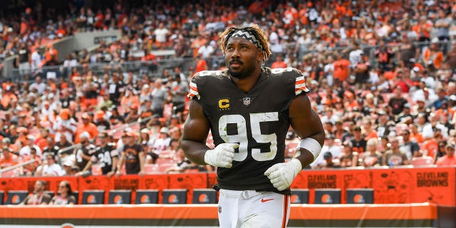 Cleveland Browns number 95 Myles Garrett runs onto the field at halftime against the New York Jets at FirstEnergy Stadium on September 18, 2022 in Cleveland, Ohio.