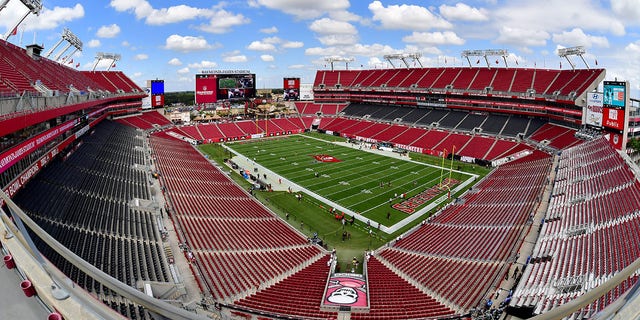 A view of empty seats as players warm up prior to a game between the Green Bay Packers and the Tampa Bay Buccaneers at Raymond James Stadium Sept. 25, 2022, in Tampa, Fla. 