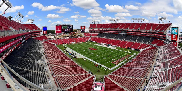 A view of empty seats as players warm up prior to a game between the Green Bay Packers and the Tampa Bay Buccaneers at Raymond James Stadium Sept. 25, 2022, in Tampa, Fla.