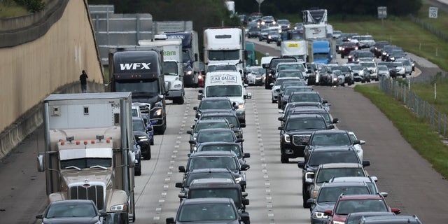 Traffic moves slowly on I-4 East as residents evacuate the Gulf Coast of Florida in advance of the arrival of Hurricane Ian on September 27, 2022 in Four Corners, Florida. 
