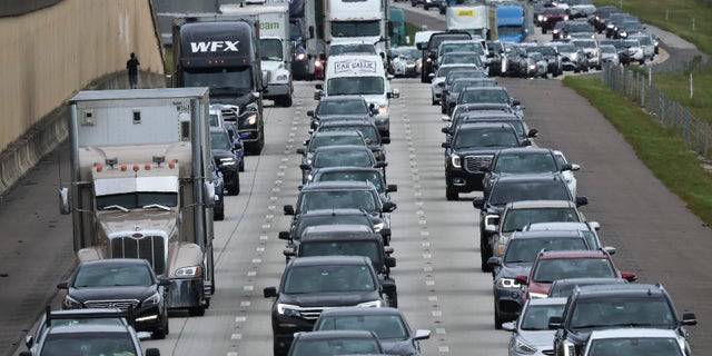 Traffic moves slowly on I-4 East as residents evacuate the Gulf Coast of Florida in advance of the arrival of Hurricane Ian on September 27, 2022 in Four Corners, Florida. 