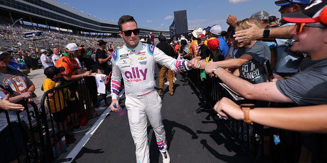 Bowman greets fans during pre-race ceremonies prior to the NASCAR Cup Series Auto Trader EchoPark Automotive 500 at Texas Motor Speedway in Fort Worth, Texas, on Sunday.