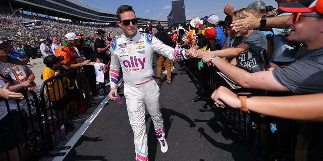 Bowman greets fans during pre-race ceremonies prior to the NASCAR Cup Series Auto Trader EchoPark Automotive 500 at Texas Motor Speedway in Fort Worth, Texas, on Sunday.