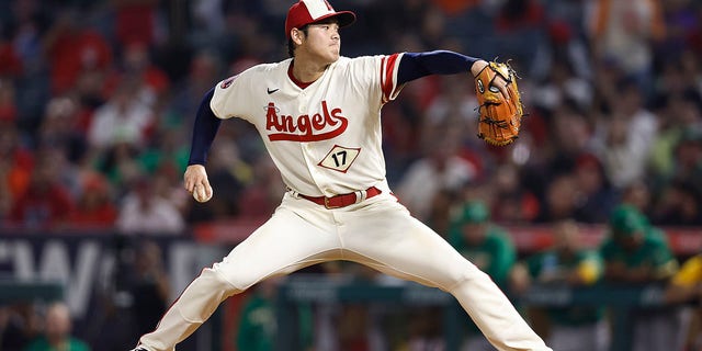Shohei Ohtani #17 of the Los Angeles Angels pitches against the Oakland Athletics during the eighth inning at Angel Stadium of Anaheim on September 29, 2022, in Anaheim, California. 