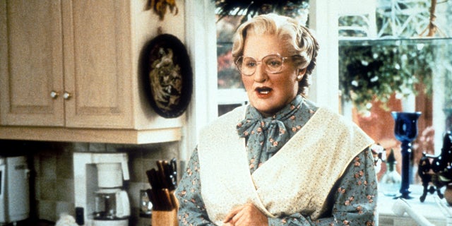 Brosnan met Williams when he was dressed as Mrs. Doubtfire and had makeup on his face.
