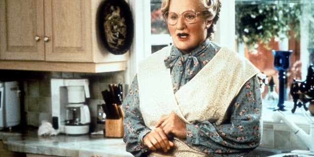 Brosnan met Williams when he was dressed as Mrs. Doubtfire and had makeup on his face.