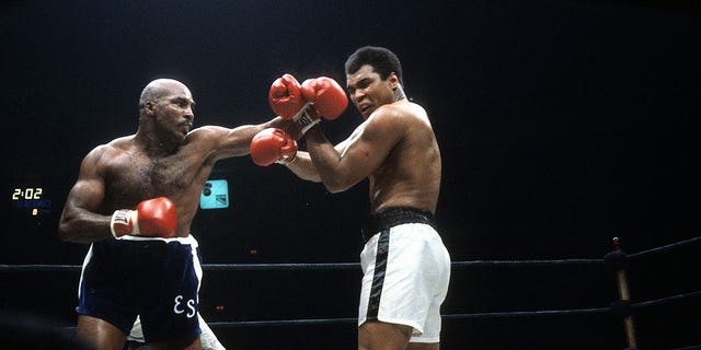 Earnie Shavers, left, throws a punch against Muhammad Ali during a 1977 fight at Madison Square Garden in New York.