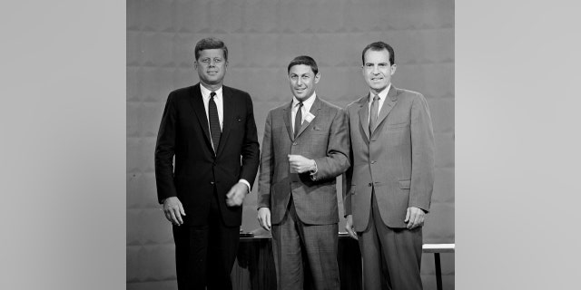 Sen. John F. Kennedy (left), Don Hewitt of CBS News (center) and Vice President Richard M. Nixon (right) at the first televised presidential debate on Sept. 26, 1960.