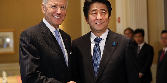 Then-Vice President Joe Biden met with then-Japanese Prime Minister Shinzo Abe on Sept. 26, 2014, in New York City. Biden is not attending Abe's funeral eight years later.