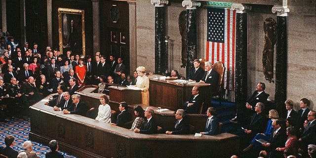 Queen Elizabeth II addresses a joint session of Congress in the House Chamber in May 1991 in Washington, D.C.