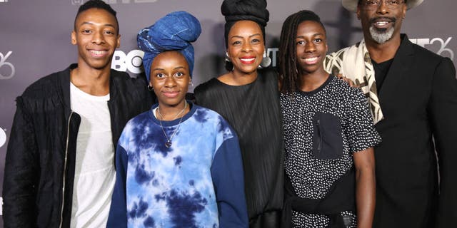 Washington said he enlisted his children to create a greeting video for his film "Corsicana." Washington is pictured with his family in 2018.