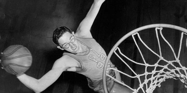 George Mikan of the Minneapolis Lakers during warmups at Madison Square Garden. 