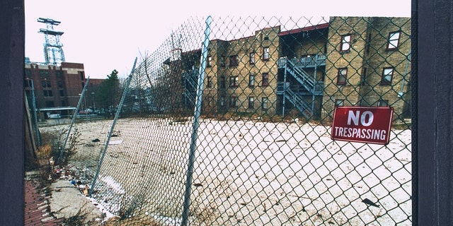 This fenced-off vacant lot is the former the site of the apartment building where serial killer Jeffrey Dahmer resided and mutilated his victims.