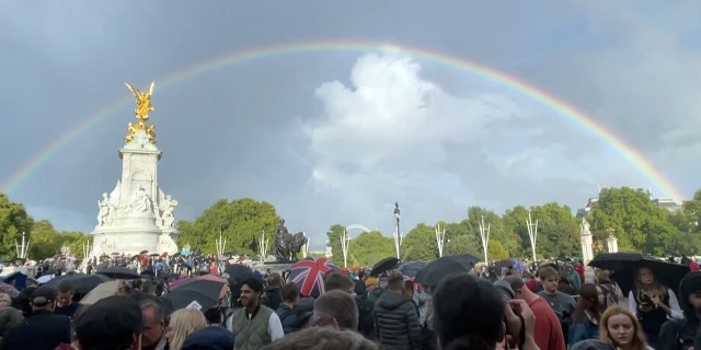 A rainbow appears over Buckingham Palace shortly before the queen's death was announced in London Sept. 8, 2022. 