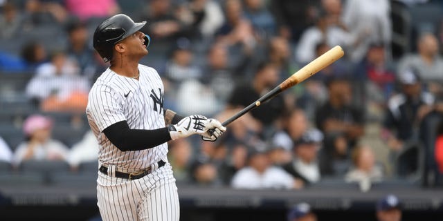 Gleyber Torres, #25 of the New York Yankees, connects on a swing for his second home run of the day during the bottom of the second inning against Luis Patino, #1 of the Tampa Bay Rays, at Yankee Stadium on Sept. 11, 2022 in the Bronx borough of New York City.
