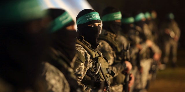 Palestinian members of the Ezzedine al-Qassam Brigades, the armed wing of the Hamas movement, in Gaza city. 
