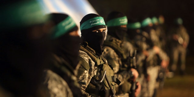 Palestinian members of the Ezzedine al-Qassam Brigades, the armed wing of the Hamas movement, in Gaza city. 