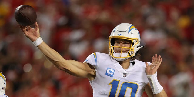 Justin Herbert #10 of the Los Angeles Chargers throws the ball during the third quarter against the Kansas City Chiefs at Arrowhead Stadium on September 15, 2022 in Kansas City, Missouri.