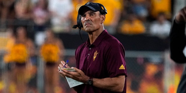 Arizona State head coach Herm Edwards looks at the scoreboard during a game against Eastern Michigan on Sept. 17, 2022 in Tempe, Arizona.