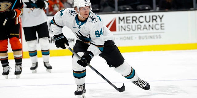 FILE - San Jose Sharks forward Alexander Barabanov, of Russia, controls the puck against the Anaheim Ducks during the first period of an NHL hockey game Sunday, Sept. 26, 2021, in Anaheim, Calif. Russian players on two NHL teams opening the season in the Czech Republic will be allowed to participate in the two Global Series games in Prague after all. Deputy Commissioner Bill Daly on Thursday, Sept. 29, 2022, confirmed to The Associated Press that the Czech government has dropped its attempted ban of Russian players for San Jose and Nashville.