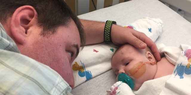 Brad Waler (pictured with baby Maverick) told Originol Digital that during a regular ultrasound, doctors saw Maverick had heart defects that would have to be treated immediately after he was born. 
