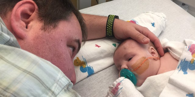 Brad Waler (pictured with baby Maverick) told Originol Digital that during a regular ultrasound, doctors saw Maverick had heart defects that would have to be treated immediately after he was born.