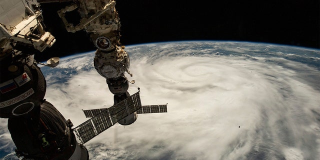 This satellite image provided by NASA on September 26, 2022, shows Hurricane Ian photographed from the International Space Station just south of Cuba as it gains strength and heads toward Florida.