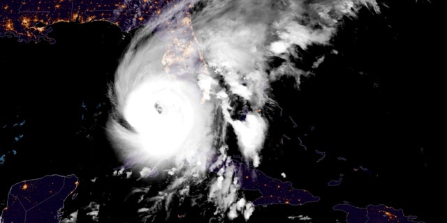 This GOES-East GeoColor satellite image taken at 12:41 a.m. EDT on Wednesday, Sept. 28, 2022, and provided by the National Oceanic and Atmospheric Administration, shows Hurricane Ian over the Gulf of Mexico.