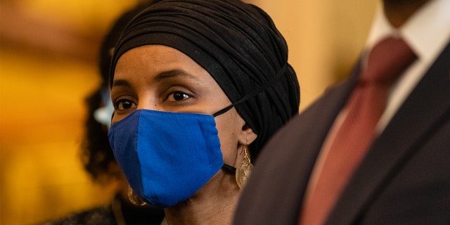 Representative Ilhan Omar, a Democrat from Minnesota, beside members of the Congressional Black Caucus at the Senate side of the U.S. Capitol in Washington, D.C., U.S., on Wednesday, Jan. 19, 2022. 